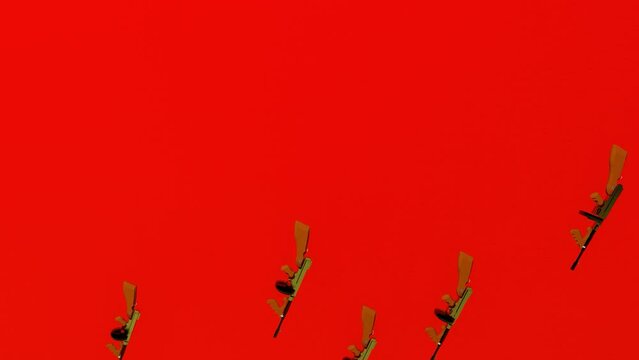 tommy gun falling with red background