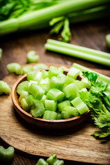 Sliced fresh celery on a cutting board. 