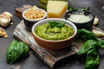 Green basil pesto with italian recipe ingredients, Basil, olive oil, parmesan, garlic, pine nuts....