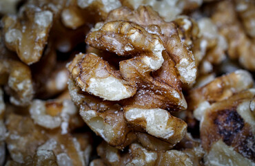 closeup of a pile of walnuts