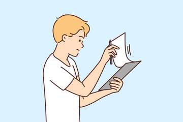 Frustrated man checking paperwork 