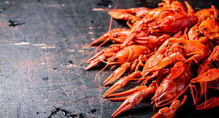 A bunch of boiled crayfish on the table. 