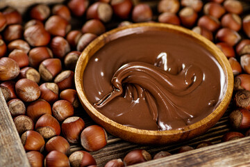Hazelnut butter on a wooden plate. 