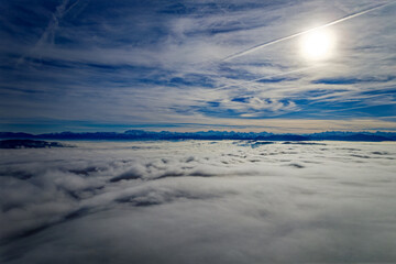 Aerial view from local mountain Uetliberg on a foggy winter day with Swiss Alps and sea of fog at Christmas Day. Photo taken December 25th, 2022, Uetliberg, Canton Zürich, Switzerland.