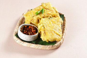 Tempe Goreng or Tempe Mendoan is Indonesian traditional food made from tempeh covered in flour batter.