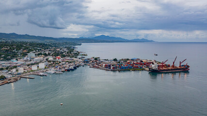 A tropical storm brewing in the hills behind Honiara city and port.