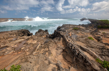 Fototapeta na wymiar Storm surf crashing into Laie point state wayside at Kaawa on the North Shore of Oahu Hawaii United States