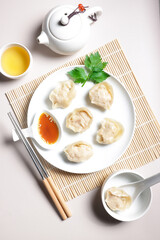 Kimchi Mandu is a Traditional Korean Dim Sum Street Food filled with kimchi.