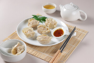 Kimchi Mandu is a Traditional Korean Dim Sum Street Food filled with kimchi.