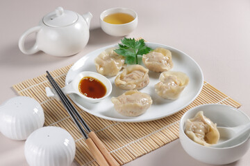 Kimchi Mandu is a Traditional Korean Dim Sum Street Food filled with kimchi.