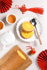 Lapis Legit Gulung is Indonesian Traditional Thousand Layered Cake Roll with Chinese New Year Red...