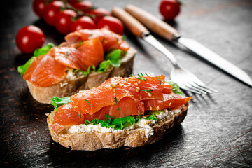 Sandwich with salmon and herbs. 