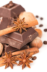 chocolate bars with its ingredients isolated on white background