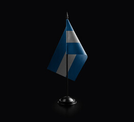 Small national flag of the Nicaragua on a black background