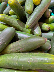 Fresh cucumber for sale at a vegetable market