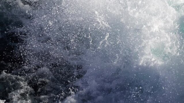 Closeup view of Wake of speed boat sailing fast