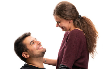 Close-up of boyfriend looking at girlfriend with cheerful expression