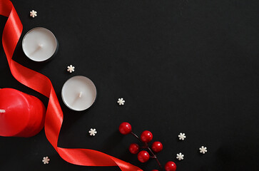 Hearts and candles on a dark background. The concept of celebrating Valentine's Day, Mother's Day