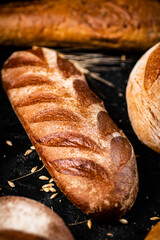 Different types of fresh bread on the table. 