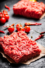 Minced meat with tomatoes and chili peppers. 