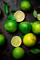 Pieces of fresh lime with foliage. 
