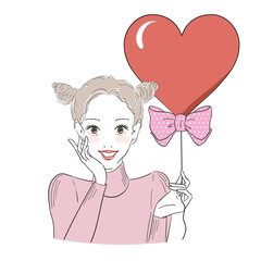 バレンタインデー　ツインお団子ヘアの女性