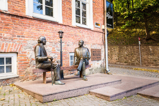 Tartu, Estonia - September 27, 2018: Bronze Sculpture of Oscar Wilde and Eduard Vilde near Kekskpark in the center of Tartu in Estonia