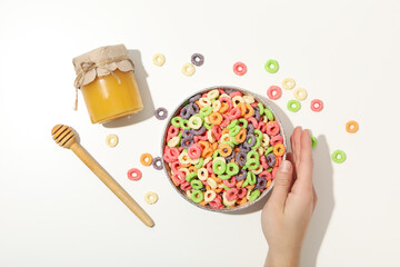Concept of breakfast food, colorful corn flakes, top view
