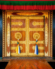 Tibetan Buddhist monastery decorated entrance door.