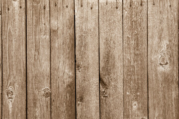 Texture of brown wooden planks. Old wooden planks. Tinted image.