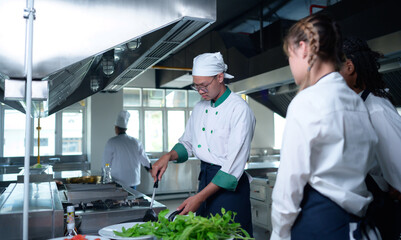 Young chef, University professor is passing on the knowledge of cooking to students