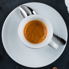 Breakfast cup of hot espresso coffee, black coffee in cup.