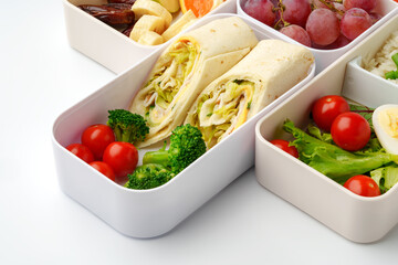 Healthy food delivery in take away box on white background