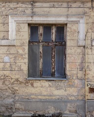 Fototapeta na wymiar vintage windows on the old facade. abandoned architecture exterior