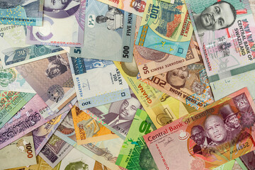 Background with folded banknotes for payment from Africa from top to bottom.