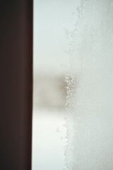 frozen condensation on the window. bad interior insulation during winter season