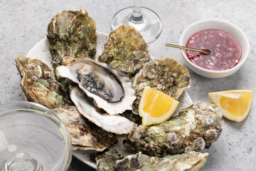 Fresh oysters with glasses of sparkling wine
