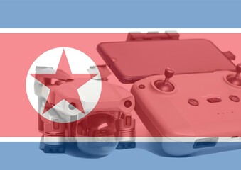 Obraz premium North Korea flag and quadcopter drone aerial camera