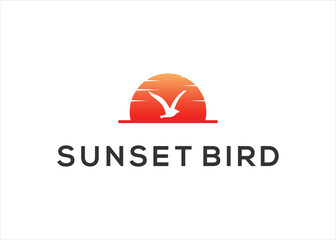 bird seagull fly on sunset logo vector illustration design