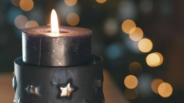 candle, fire, wax, purple, light, ornament, decoration, decor, decorate, light, christmas, holiday, pine, tree, glass, spark, sparkles, star, stars, bokeh, orange, green, color, move, no people, fir