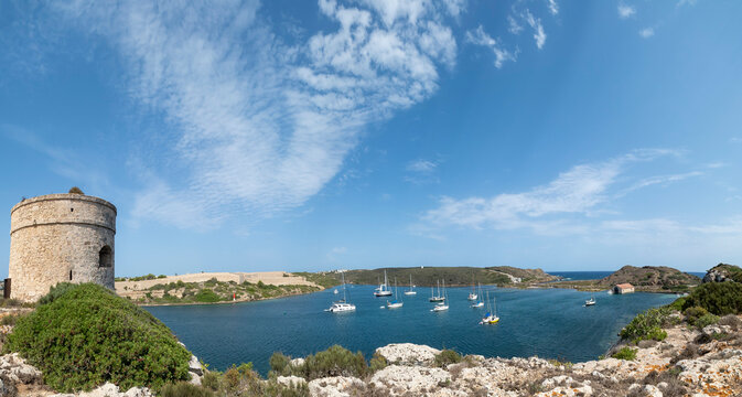 Spain, Balearic Islands, Mahon, Mola Fortress with sailboats in background