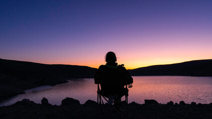 Fototapeta na wymiar dam lake sunset silhouette
