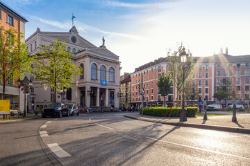Germany, Bavaria, Munich, Gartnerplatztheater opera house and Gartnerplatz square at sunset