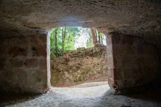 Ancient cave in front of walkway