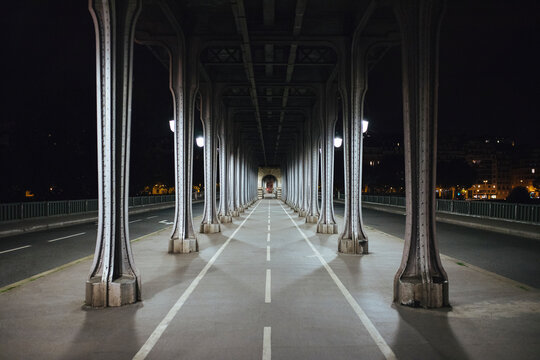 France, Ile-de-France, Paris, Underside ofPont de Bir-Hakeim at night