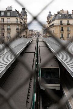 France, Ile-de-France, Paris, Subway platform seen through chainlink fence