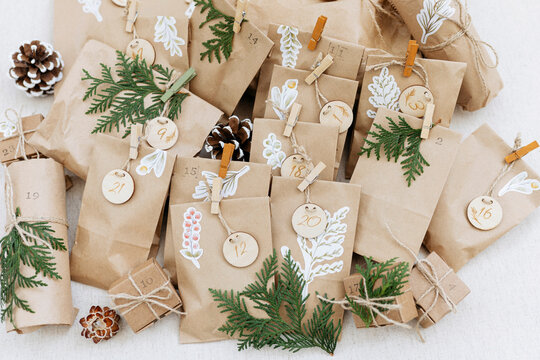 Brown paper bags with numbers kept on carpet