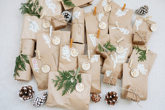 Brown paper bags with decorations kept on carpet