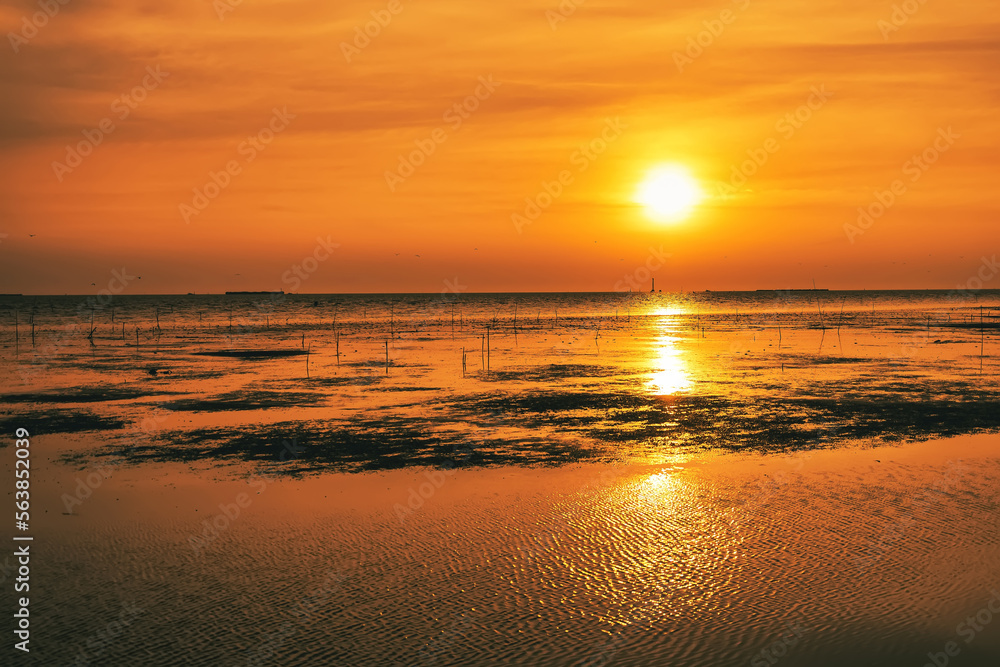 Wall mural Beautiful sunset on the ocean coast.Thailand.