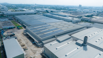 Top view Solar Cell on Warehouse Factory. Solar photo voltaic panels system power or Solar Cell on industrial building roof for producing green ecological electricity. Production of renewable energy. © Yellow Boat